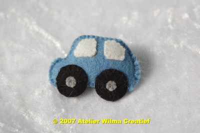 Broche auto zonnegeel pakket
