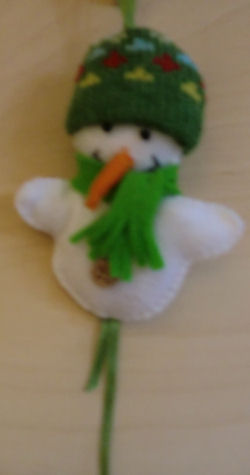 Sneeuwpopje groen pakket - Klik op de afbeelding om het venster te sluiten